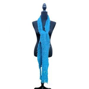 Woman’s turquoise soft scarf